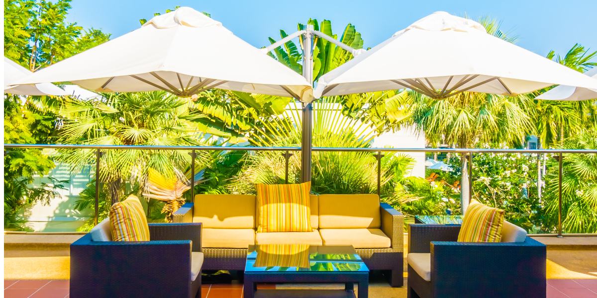 Outdoor deck with umbrella and chair
